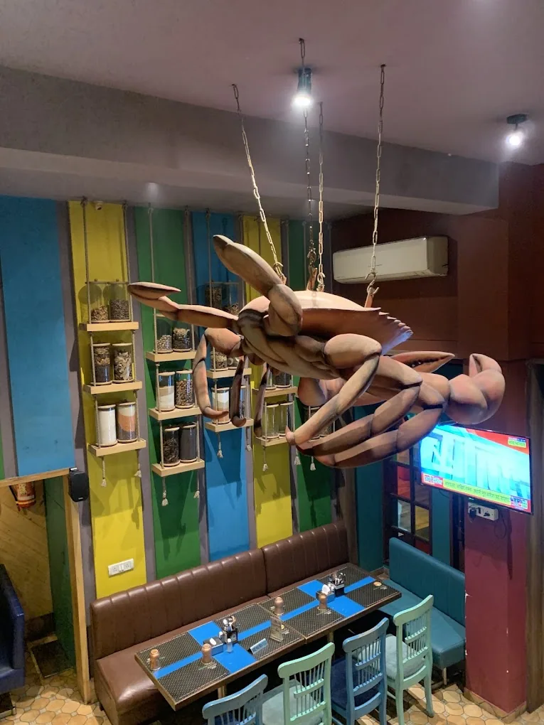 A giant crab sculpture above the dining room