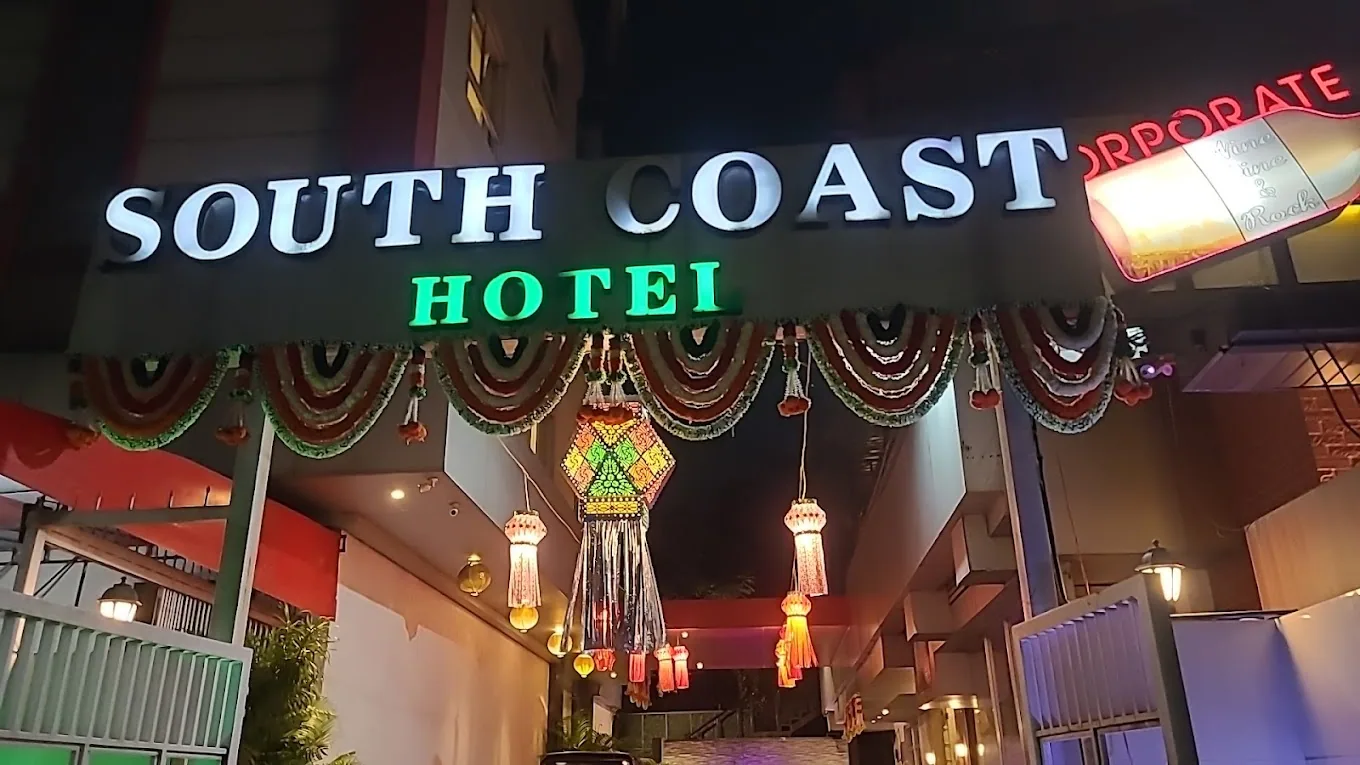 Hotel South Coast signage at night